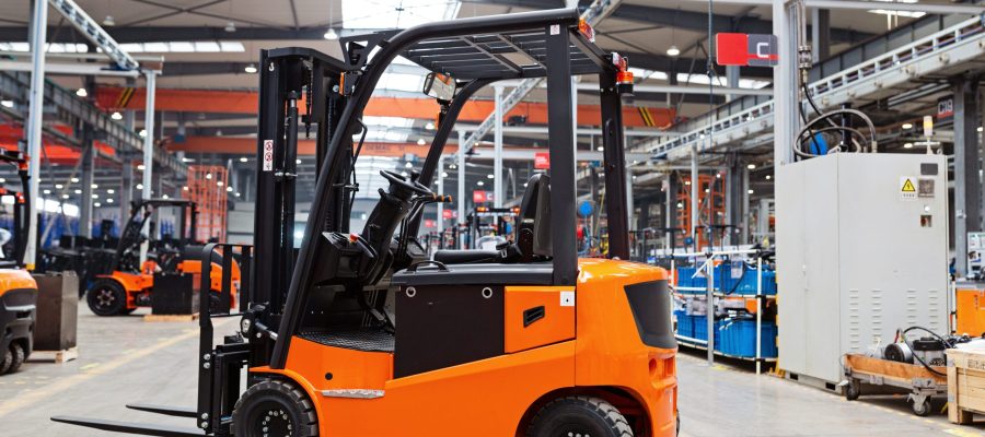 new-forklift-is-standing-on-modern-warehouse-2024-11-07-13-26-42-utc